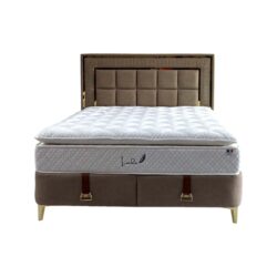 a mattress on a bed
