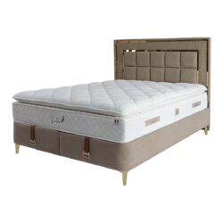 a mattress on a bed